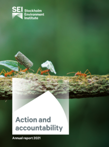 First page of Annual report 2021 with leaf-cutter ants carrying assortment of leaves and fish-food on branch, UK
